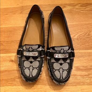Black flat Coach shoes